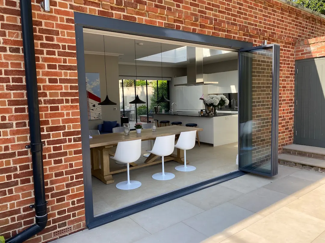 Anthracite grey patio doors, open. Slide and turn doors (alternative to bifolds)