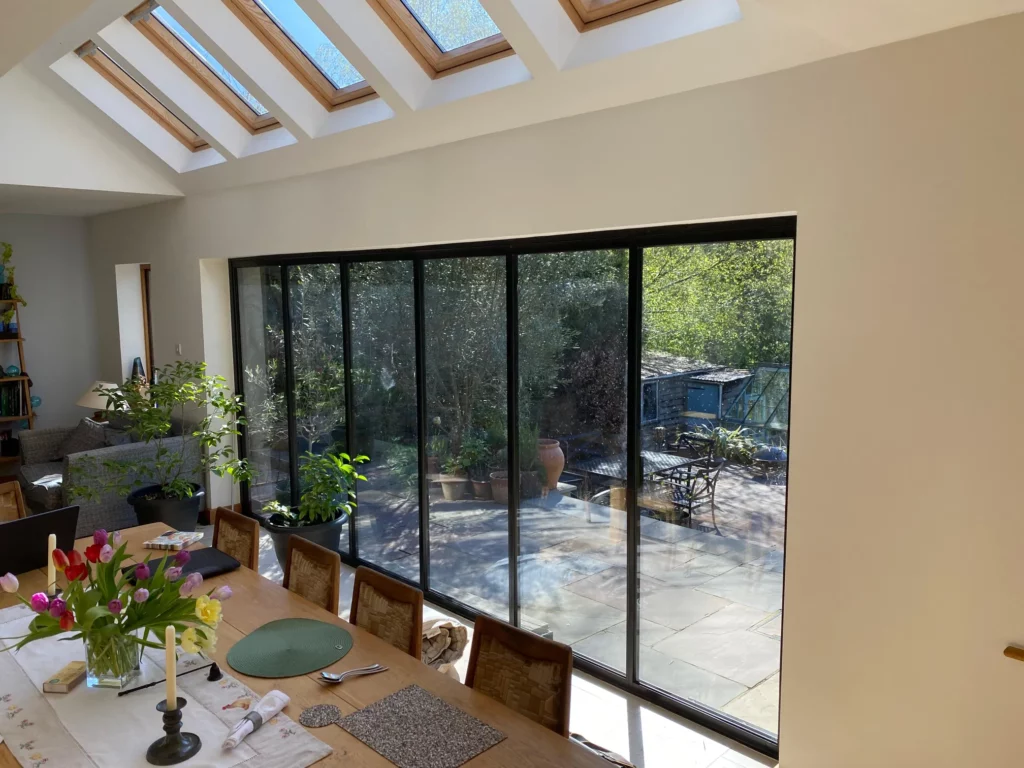 Bi-fold patio doors installed in a UK dining room extension