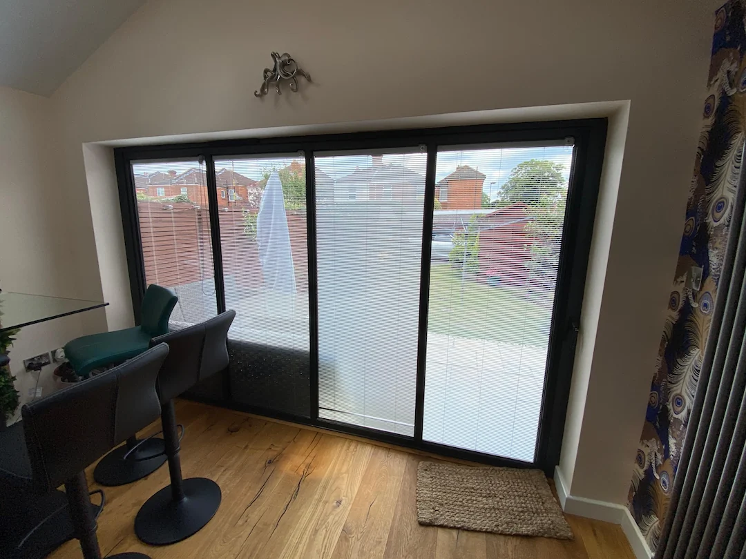 External bifold patio doors with integral blinds