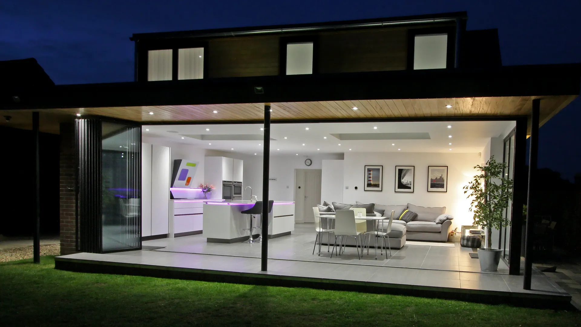 Large bifold doors at night