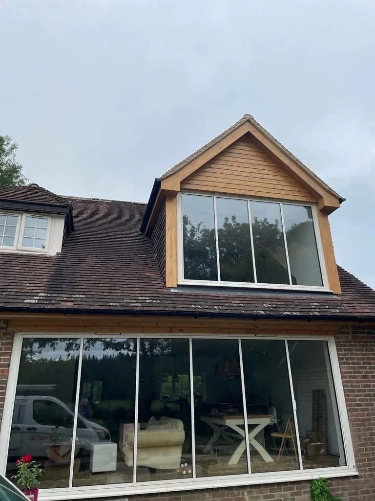 White bifold doors, upstairs and downstairs matching