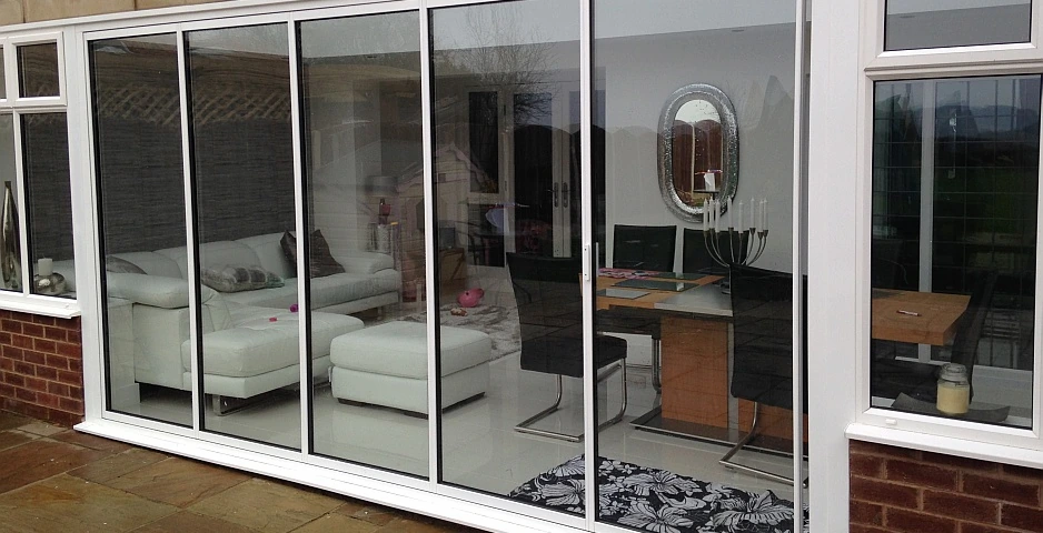 White bifold patio doors, 5 panel