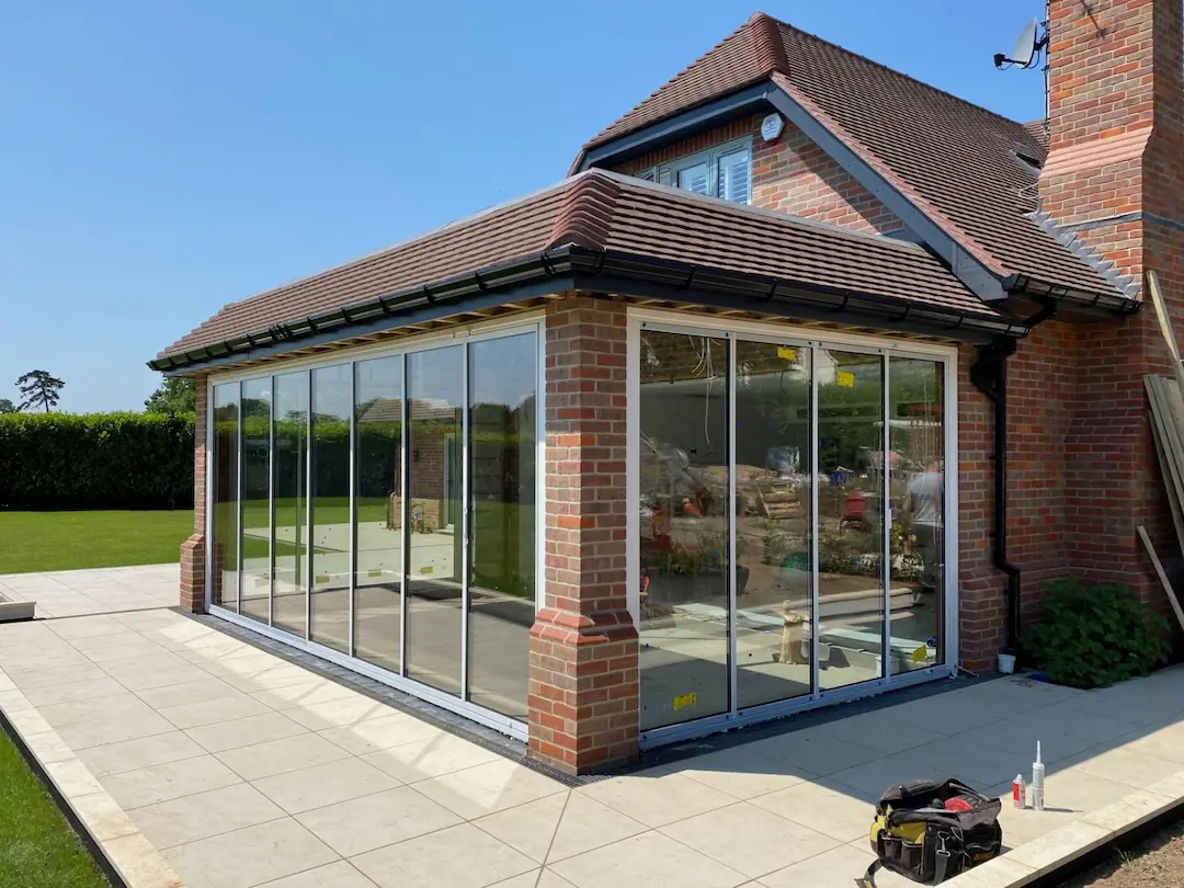 White slimline aluminium bifold patio doors