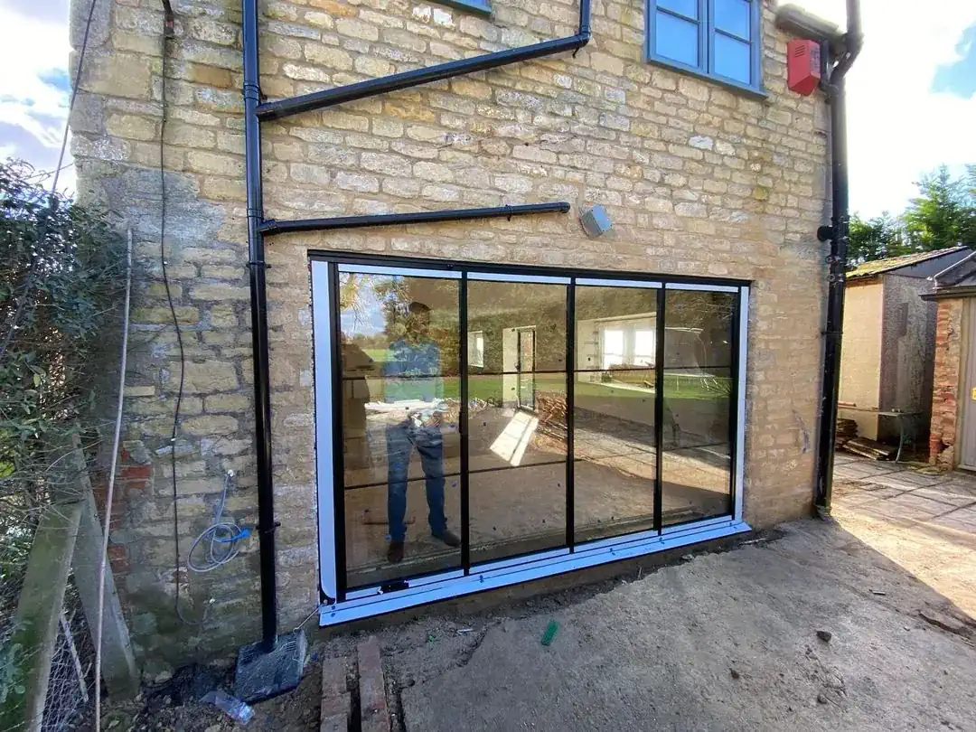 Georgian bar (Crittall style) external bifolding doors in black