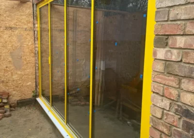 yellow bi-fold doors