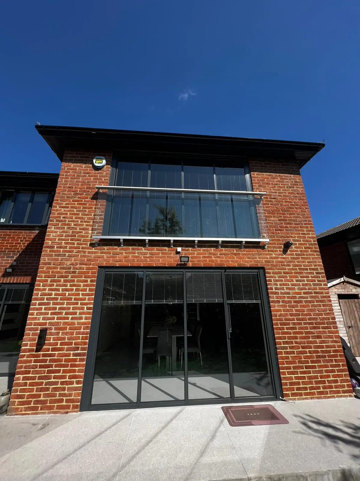 black metal sliding doors ground and first floor