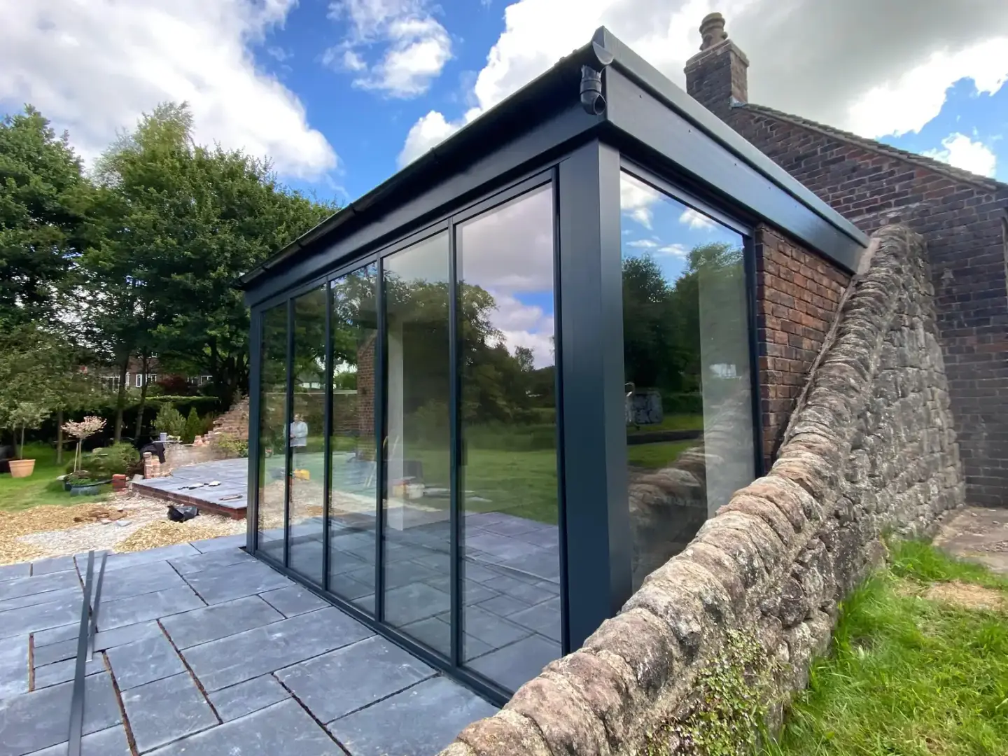 grey floor to ceiling bifold doors