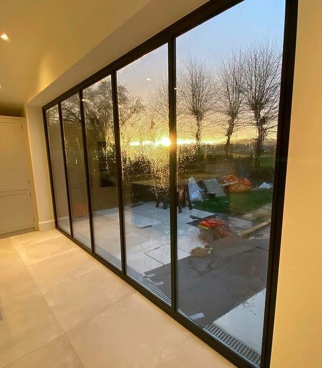 5 leaf bifold doors at sunset