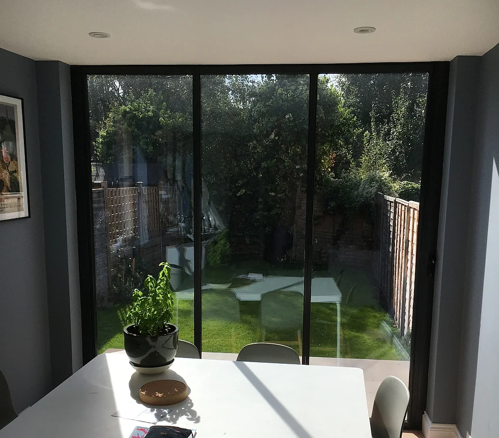 compact black aluminium bifold doors