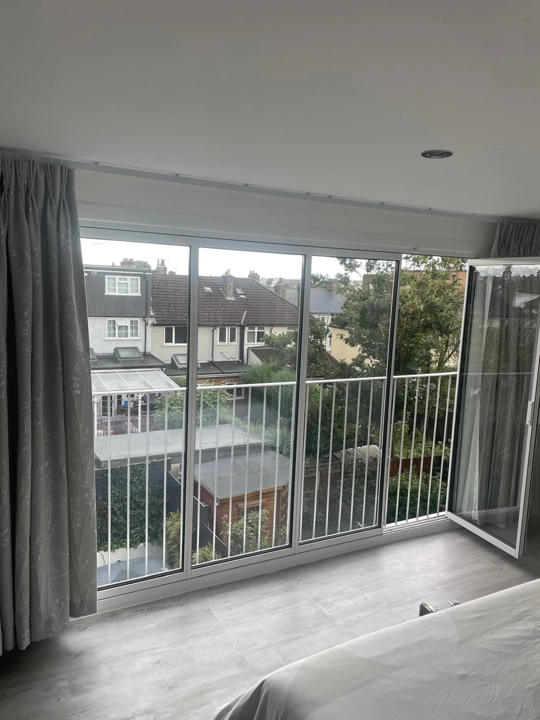 white bifold balcony doors